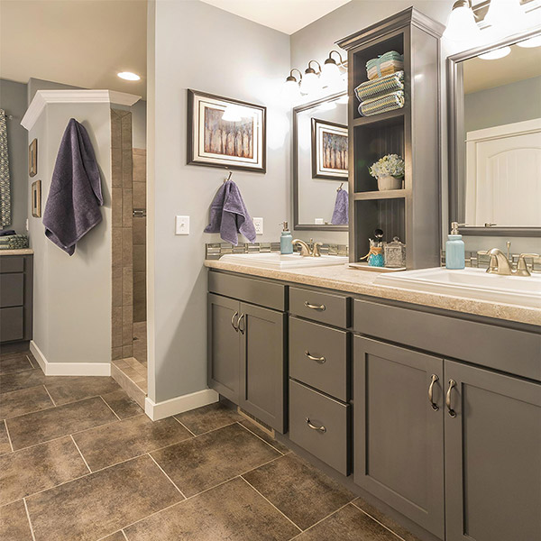 A classic-style bathroom showcasing white bathroom cabinets in Lancaster, PA